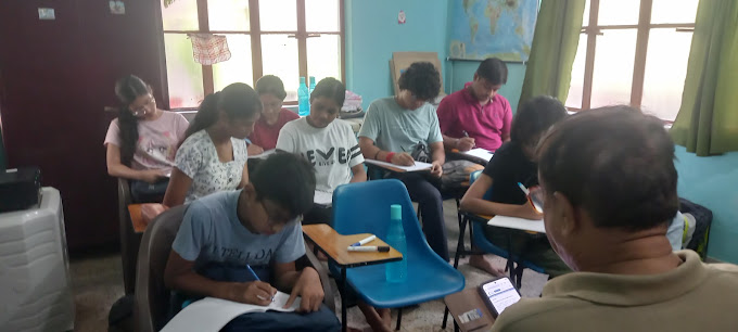 Focused classroom session at Excellence Academy
